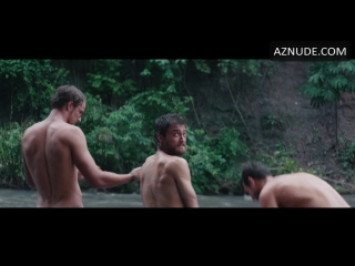 actors alex russell, daniel radcliffe and joel jackson in the film the jungle